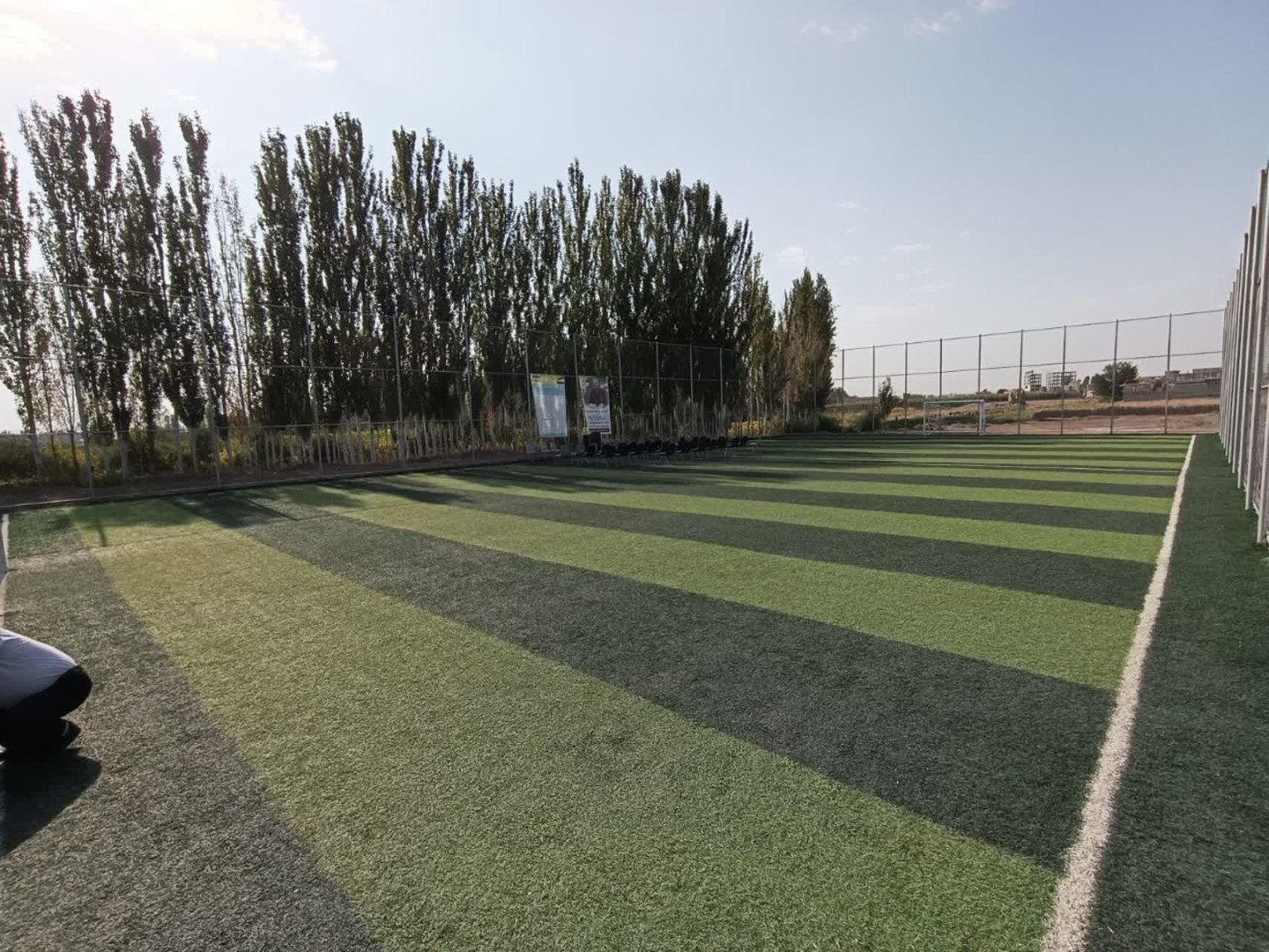 افتتاح زمین چمن مصنوعی روستای بدلآباد خوی در هفته دولت